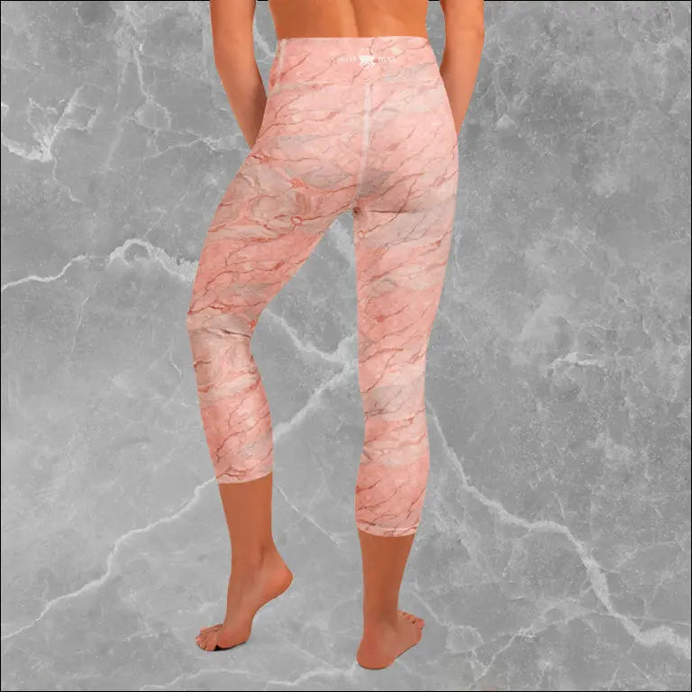 Jelly Kvlt high-waisted yoga capri leggings with a colorful cosmic print